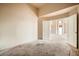 A room featuring neutral carpeting at 9532 Calico Garden Ave, Las Vegas, NV 89134