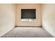 Neutral bedroom featuring neutral walls, plush carpeting, and a single window at 9532 Calico Garden Ave, Las Vegas, NV 89134