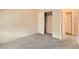 Neutral bedroom with closet and door leading to the rest of the house at 9532 Calico Garden Ave, Las Vegas, NV 89134