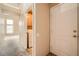 Hallway leads to the laundry room and front door at 9532 Calico Garden Ave, Las Vegas, NV 89134