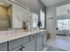 Spacious bathroom with double sinks, stylish cabinets and modern fixtures at 9974 Petroglyph Canyon Ave, Las Vegas, NV 89166