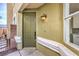 A welcoming front door entrance, exterior lighting, and attractive neutral exterior paint at 1024 Coatbridge St, Las Vegas, NV 89145