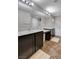 Bathroom with double sinks and stylish tile flooring, offering a blend of luxury and functionality at 11036 Mount Hunter St, Las Vegas, NV 89179