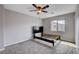 Bedroom featuring carpeted floors, natural light, neutral paint, and a bed frame at 11036 Mount Hunter St, Las Vegas, NV 89179