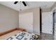 Bedroom featuring one bed, sliding closet doors, neutral paint, and carpeted floors at 11036 Mount Hunter St, Las Vegas, NV 89179