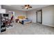 Generously sized bedroom with carpet, ceiling fan, and ample space for personalization at 11036 Mount Hunter St, Las Vegas, NV 89179