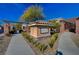 Community entrance with signage and landscaping at 11036 Mount Hunter St, Las Vegas, NV 89179