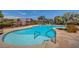 Resort-style community pool with beautiful landscaping, offering a relaxing atmosphere for residents at 11036 Mount Hunter St, Las Vegas, NV 89179