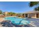 Resort-style community pool with ample seating, perfect for relaxation and socializing on sunny days at 11036 Mount Hunter St, Las Vegas, NV 89179