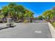 Gated community entrance with meticulously maintained landscaping offers security and an upscale living environment at 11036 Mount Hunter St, Las Vegas, NV 89179