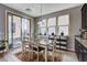 Bright dining area adjacent to the kitchen with sliding doors to the patio at 11036 Mount Hunter St, Las Vegas, NV 89179
