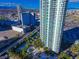 Overhead shot of a high-rise condo showcasing the outdoor pool, tennis courts, and city landscape at 322 Karen Ave # 4207, Las Vegas, NV 89109