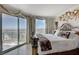 Bedroom showcasing city views, decorative wall art, and an ornate bed frame at 322 Karen Ave # 4207, Las Vegas, NV 89109