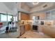 Well-equipped kitchen featuring stainless steel appliances and generous granite countertop space at 322 Karen Ave # 4207, Las Vegas, NV 89109