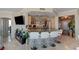 Stylish kitchen featuring bar seating connecting to the living area, perfect for gatherings at 322 Karen Ave # 4207, Las Vegas, NV 89109