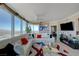 Bright living room with stylish decor, large windows offering panoramic views at 322 Karen Ave # 4207, Las Vegas, NV 89109