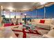 Bright living room with floor to ceiling windows showing a cityscape view and luxury finishes at 322 Karen Ave # 4207, Las Vegas, NV 89109