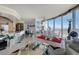 Open concept living space with kitchen and dining area boasting floor to ceiling windows and decor at 322 Karen Ave # 4207, Las Vegas, NV 89109