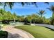 Practice your short game on this well-manicured putting green, nestled among lush landscaping and mature trees at 322 Karen Ave # 4207, Las Vegas, NV 89109
