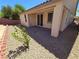Backyard patio with lush plantings and desert landscaping at 4032 Little Bay Ave, North Las Vegas, NV 89081