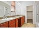 Elegant bathroom features double sinks, granite countertops, and a glass-enclosed shower at 4032 Little Bay Ave, North Las Vegas, NV 89081