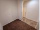 Corner bedroom with neutral colored walls and brown carpet at 4032 Little Bay Ave, North Las Vegas, NV 89081
