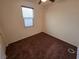 Cozy bedroom with carpet, natural light, and ample closet space for comfortable living at 4032 Little Bay Ave, North Las Vegas, NV 89081