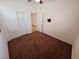 Bedroom with a neutral color scheme, carpet, and closet with white sliding doors at 4032 Little Bay Ave, North Las Vegas, NV 89081