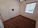 Neutral bedroom featuring carpet, a ceiling fan, and a bright window at 4032 Little Bay Ave, North Las Vegas, NV 89081