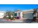 Lovely single-story home with a well manicured front yard and brick paved driveway at 4032 Little Bay Ave, North Las Vegas, NV 89081