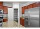 Beautiful kitchen with granite countertops, stainless steel appliances, and a pantry with shelving at 4032 Little Bay Ave, North Las Vegas, NV 89081
