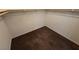 Spacious walk-in closet featuring neutral carpeting and ample storage space, perfect for organization at 4032 Little Bay Ave, North Las Vegas, NV 89081
