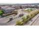 Community entrance with well-kept landscaping, decorative features, and a clear neighborhood sign at 4533 Queens Hill St, North Las Vegas, NV 89031