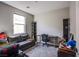 Bedroom features a desk, couch and ample space for storage at 4533 Queens Hill St, North Las Vegas, NV 89031