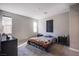 Bedroom featuring ample natural light and a calm, neutral color palette at 4533 Queens Hill St, North Las Vegas, NV 89031