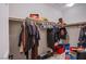 Well-organized walk-in closet featuring clothing racks, shelves, and a variety of storage solutions to keep belongings tidy at 4533 Queens Hill St, North Las Vegas, NV 89031