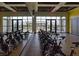 Bright and airy gym featuring modern spin bikes and floor-to-ceiling windows with mountain views at 9655 Skye Star Ave, Las Vegas, NV 89166