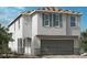 Charming two-story home with neutral stucco, shuttered windows and attached two car garage at 10026 Indy Rey Ct, Las Vegas, NV 89148