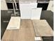 Close up on Elkins White upgraded cabinets, Calcatta Patriotic quartz and Toasted Taupe flooring at 10026 Indy Rey Ct, Las Vegas, NV 89148