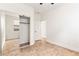 Bedroom with mirrored closet doors and hardwood flooring at 10393 Trailing Dalea Ave, Las Vegas, NV 89135
