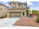 Charming two-story home showcasing a well-maintained lawn and a neutral color palette at 10393 Trailing Dalea Ave, Las Vegas, NV 89135