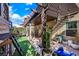 Inviting backyard features a covered patio with playhouse and outdoor seating, perfect for Gathering gatherings and relaxation at 10433 Mount Washington Ave, Las Vegas, NV 89166