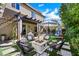 Beautifully landscaped backyard with a fire pit and lounge chairs, perfect for outdoor gatherings and enjoying the fresh air at 10433 Mount Washington Ave, Las Vegas, NV 89166