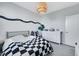 Childs bedroom features car wall decor, a large window, and modern furnishings at 10433 Mount Washington Ave, Las Vegas, NV 89166