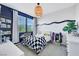 bedroom with blue accent wall, cute car-themed decor, and plenty of natural light at 10433 Mount Washington Ave, Las Vegas, NV 89166