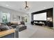 Inviting entertainment room featuring a projector screen, backyard access, and fun decor at 10433 Mount Washington Ave, Las Vegas, NV 89166