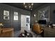 Sophisticated home office with dark wainscoting, leather furniture, and modern artwork at 10433 Mount Washington Ave, Las Vegas, NV 89166