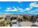 Enjoy stunning views from this rooftop deck with a built-in barbecue, lounge seating, and potted plants at 10433 Mount Washington Ave, Las Vegas, NV 89166