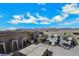 Outdoor rooftop deck with seating and mountain views, ideal for entertaining and enjoying the picturesque landscape at 10433 Mount Washington Ave, Las Vegas, NV 89166