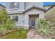 Inviting home exterior featuring well-maintained landscaping and a charming covered entry at 10663 Sariah Skye Ave, Las Vegas, NV 89166